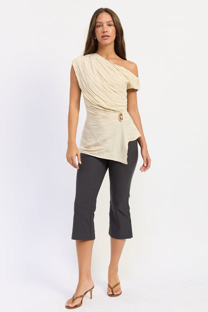 Beige Emory Park Willow top displayed on a hanger, showcasing its casual style and soft fabric for everyday wear.