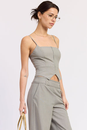 Emory Park Natalie vest top in charcoal, sleeveless blouse with a relaxed fit and rounded neckline, displayed on a hanger.
