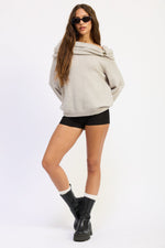 Emory Park Nadia grey sweater, cozy knit fabric, long sleeves, and classic fit displayed on a hanger.