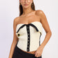 Emory Park Alyssa ivory tube top with fitted design, shown on a hanger against a neutral background.