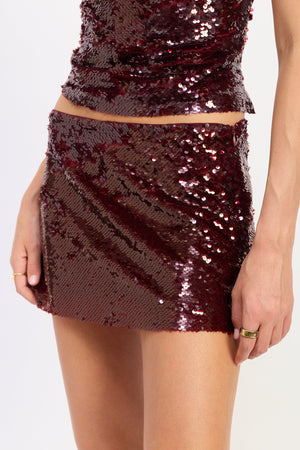 Ayla Mini Skort by Emory Park in ruby, featuring a stylish short skirt design with a comfortable fit and lightweight fabric.