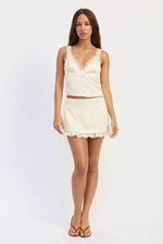 Emory Park Cecily Top in ivory, showcasing a stylish, lightweight blouse with a relaxed fit and elegant design.