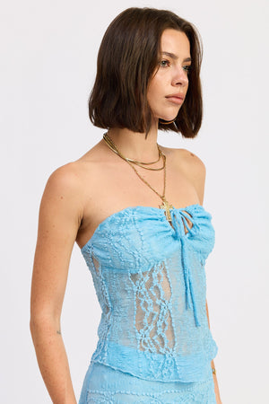 Emory Park baby blue Zara tube top for women, close-up view of the fitted sleeveless top with smooth fabric.