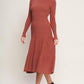 Rust-colored Stolen Kisses Sweater Midi Dress by Flying Tomato, featuring a cozy knitted design and relaxed fit.