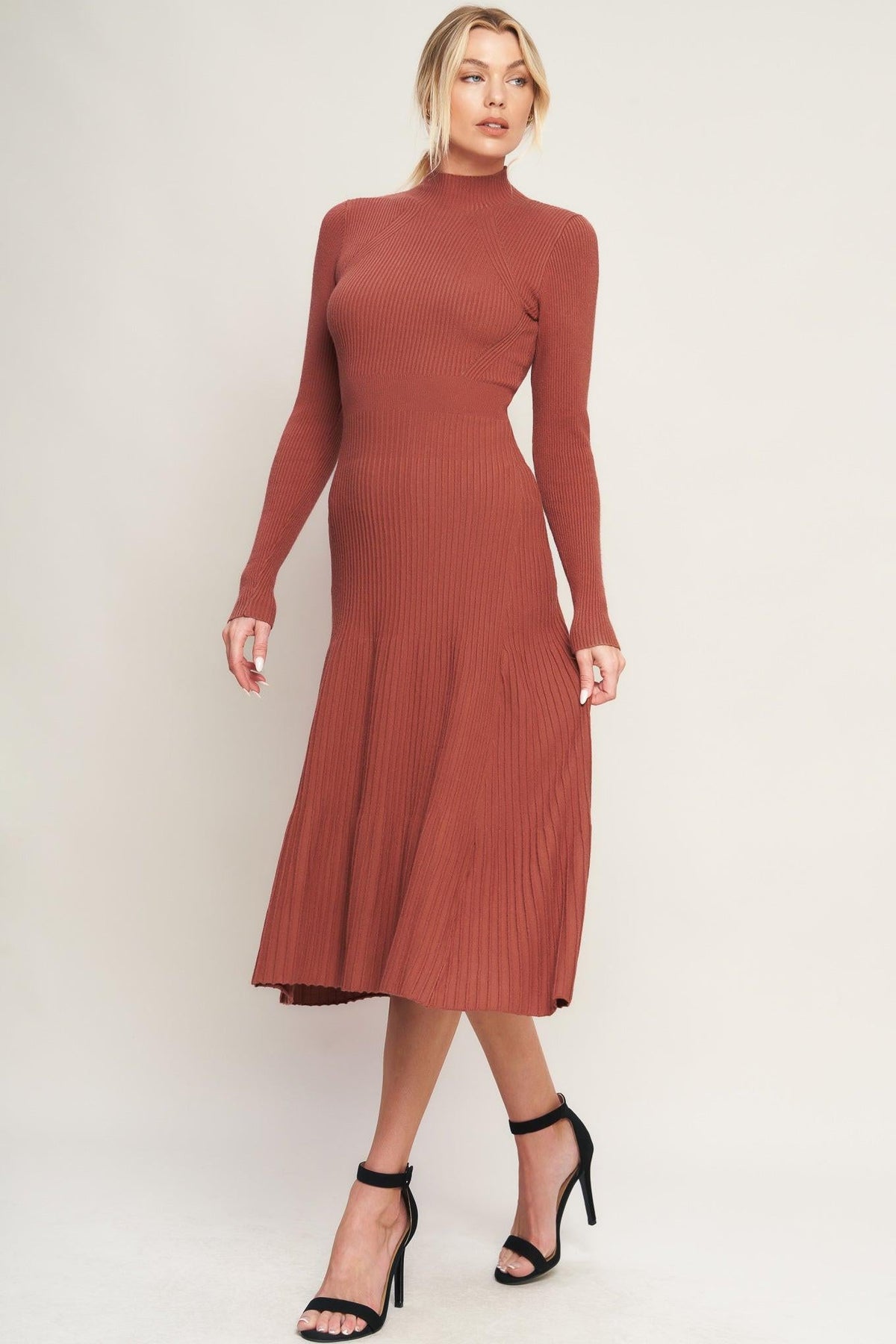 Rust-colored Stolen Kisses Sweater Midi Dress by Flying Tomato, featuring a cozy knitted design and relaxed fit.