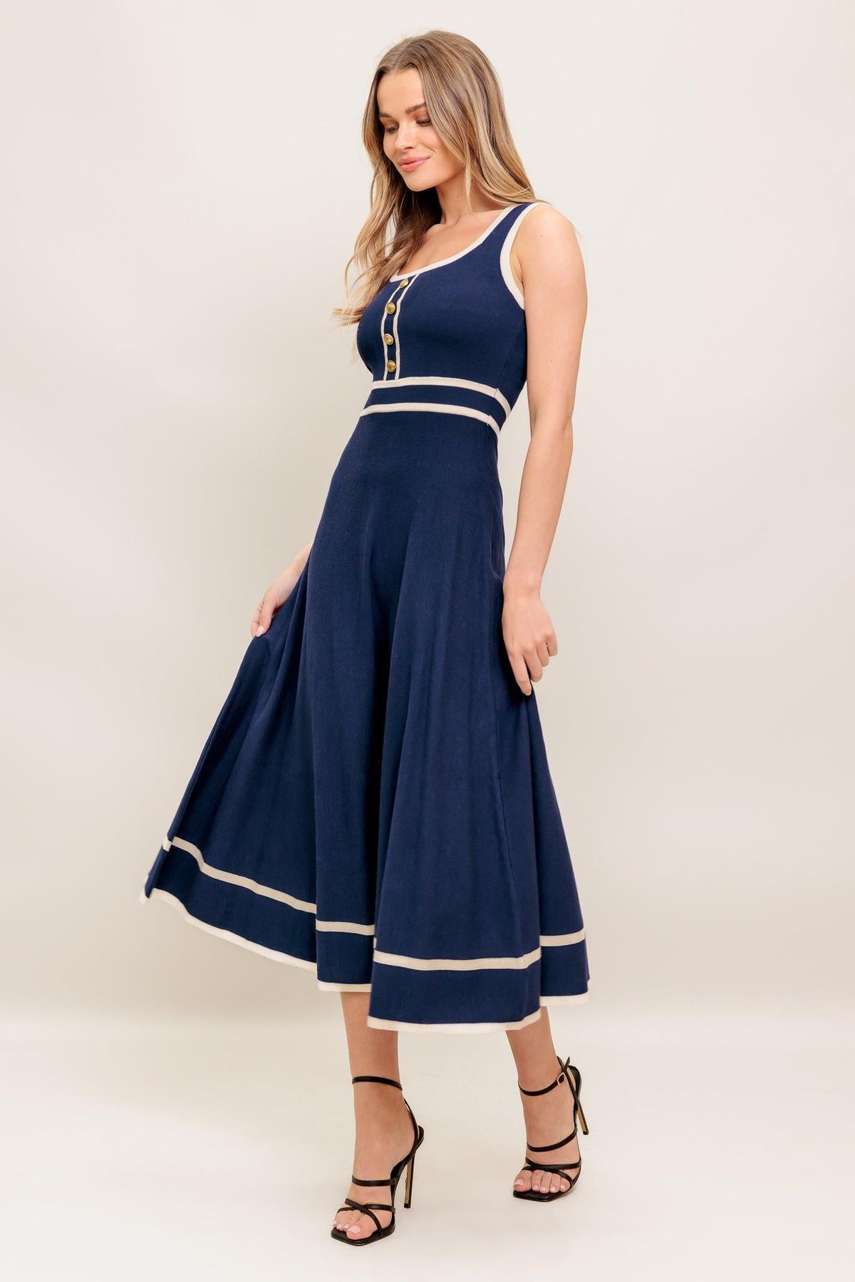 Flying Tomato Dreamy Daisy Knit Midi Dress in navy and ivory, featuring a cozy sweater design with floral daisy patterns.