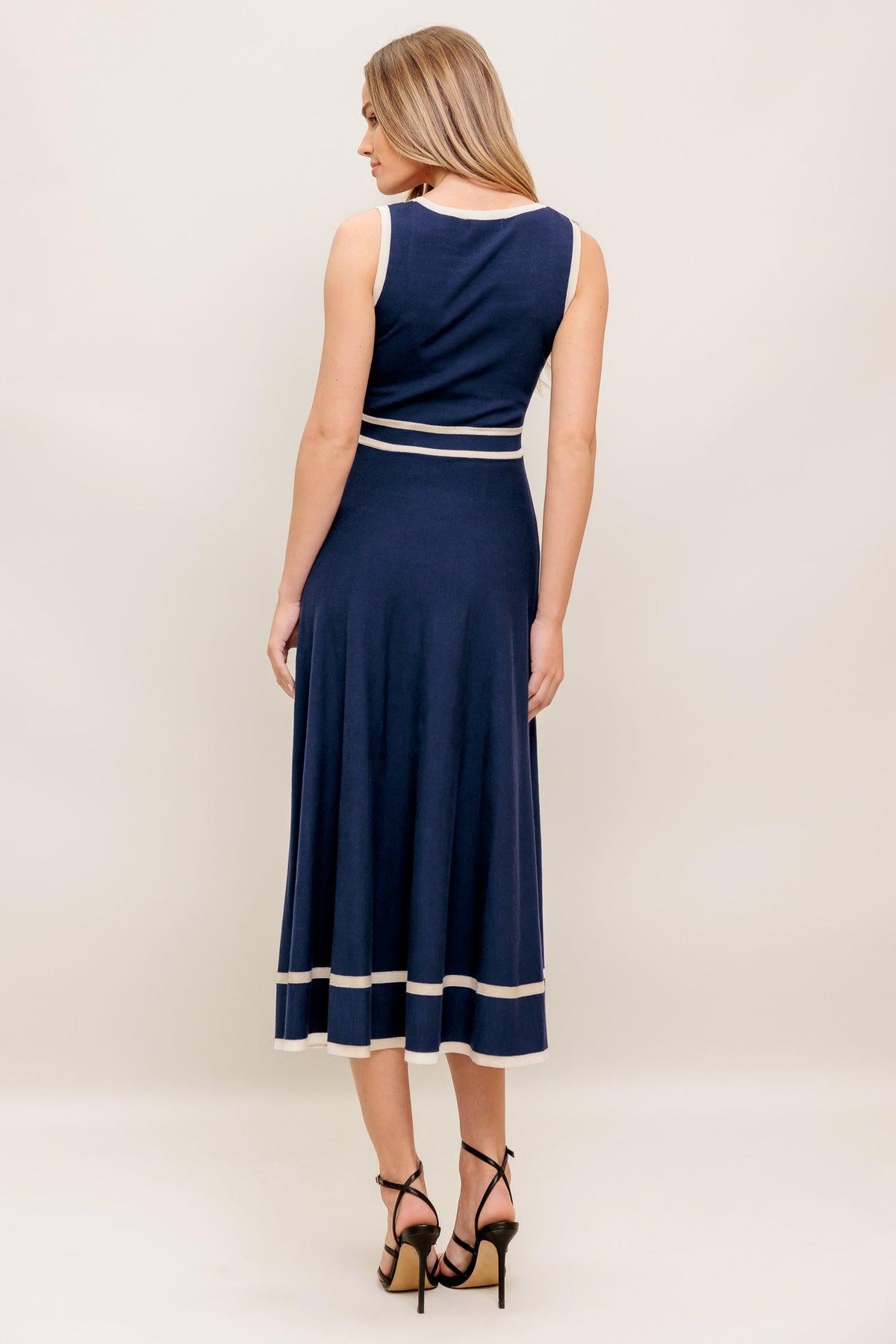 Flying Tomato Dreamy Daisy Knit Midi Dress in navy and ivory, featuring a cozy sweater knit with a floral daisy pattern.