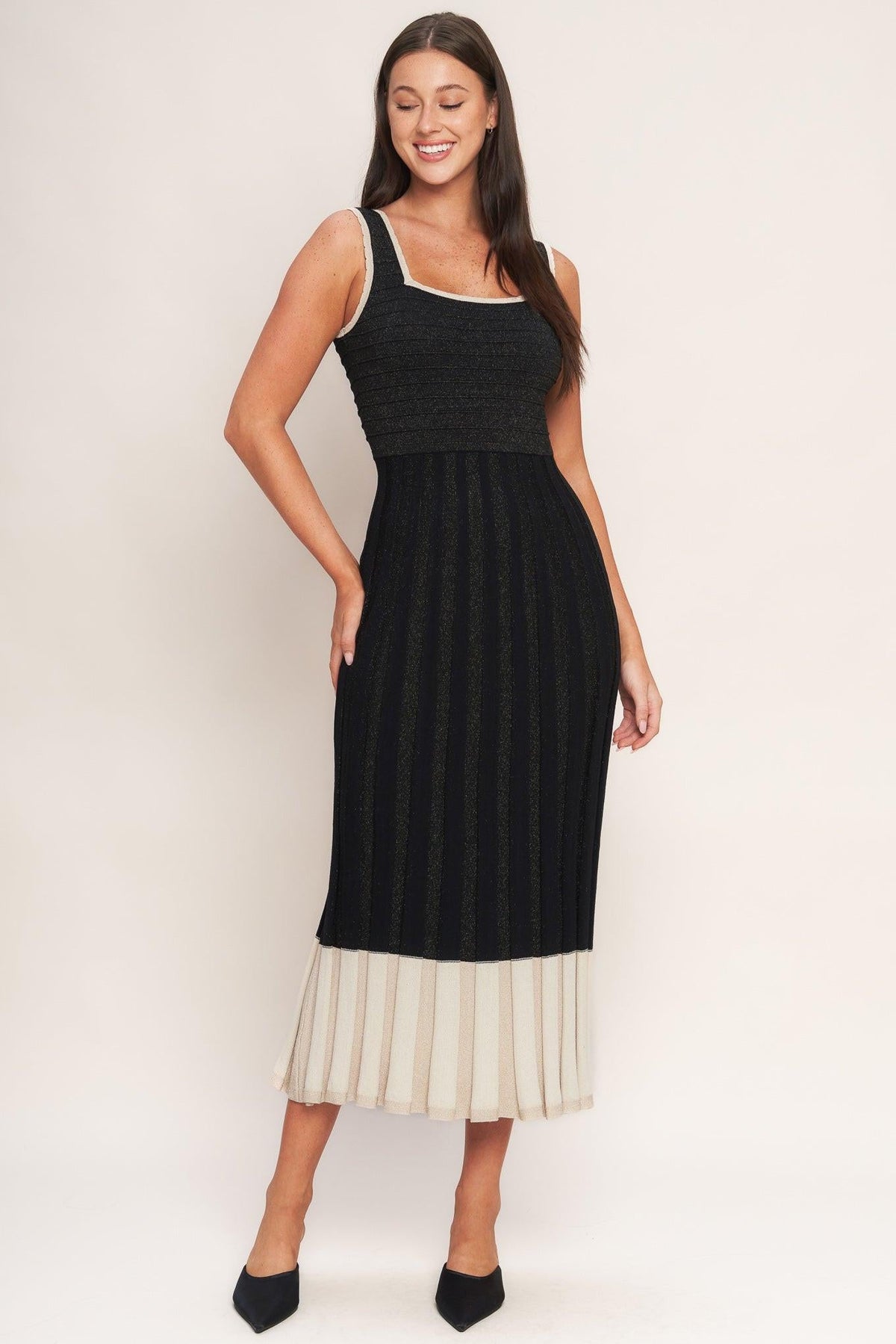 Flying Tomato Noir Éclat sweater knit midi dress in black and cream, featuring a cozy, stylish sweater dress design.