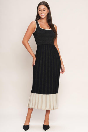 Flying Tomato Noir Éclat sweater knit midi dress in black and cream, featuring a cozy, stylish sweater dress design.