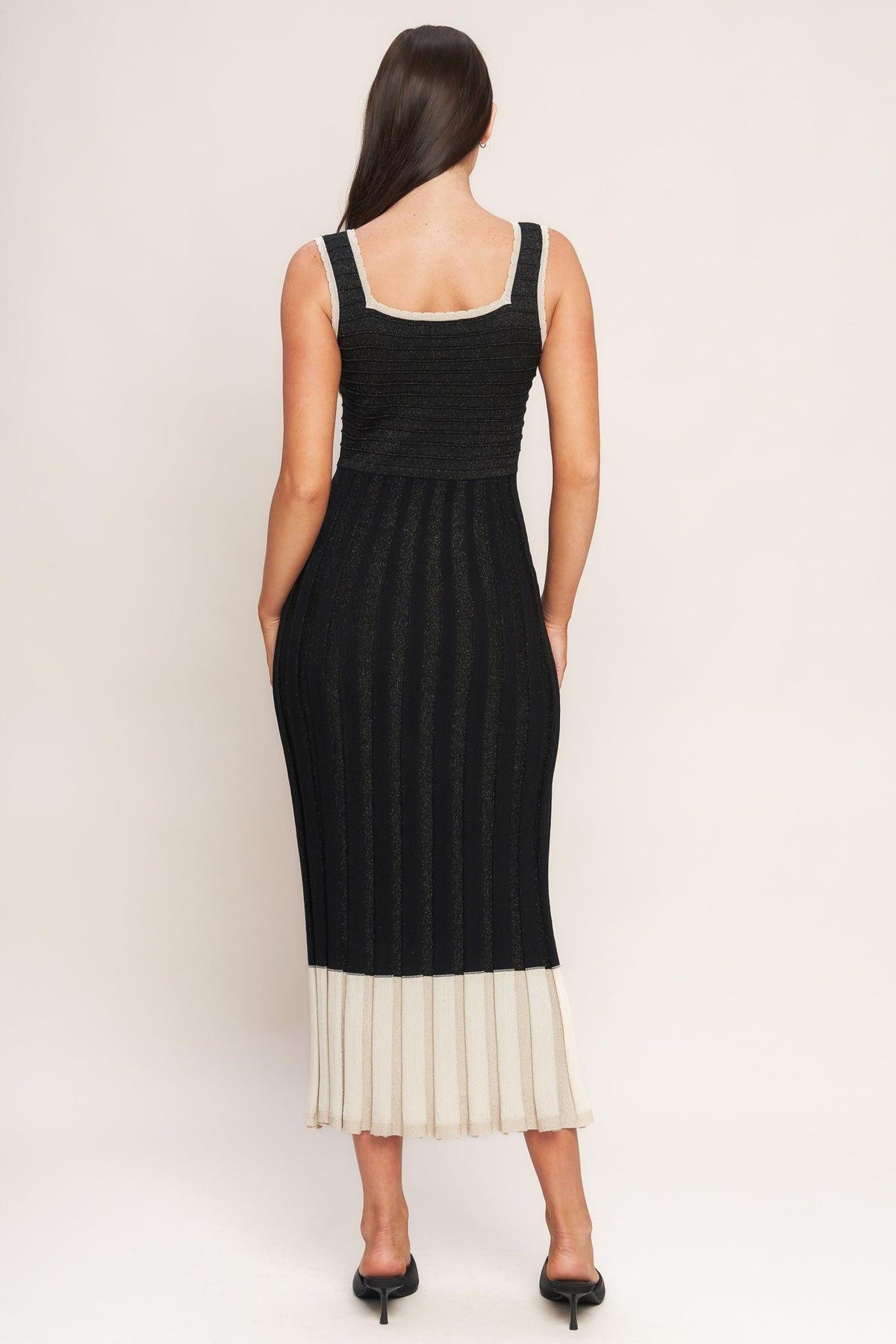 Flying Tomato Noir Éclat sweater knit midi dress in black and cream, featuring a cozy, textured knit design.