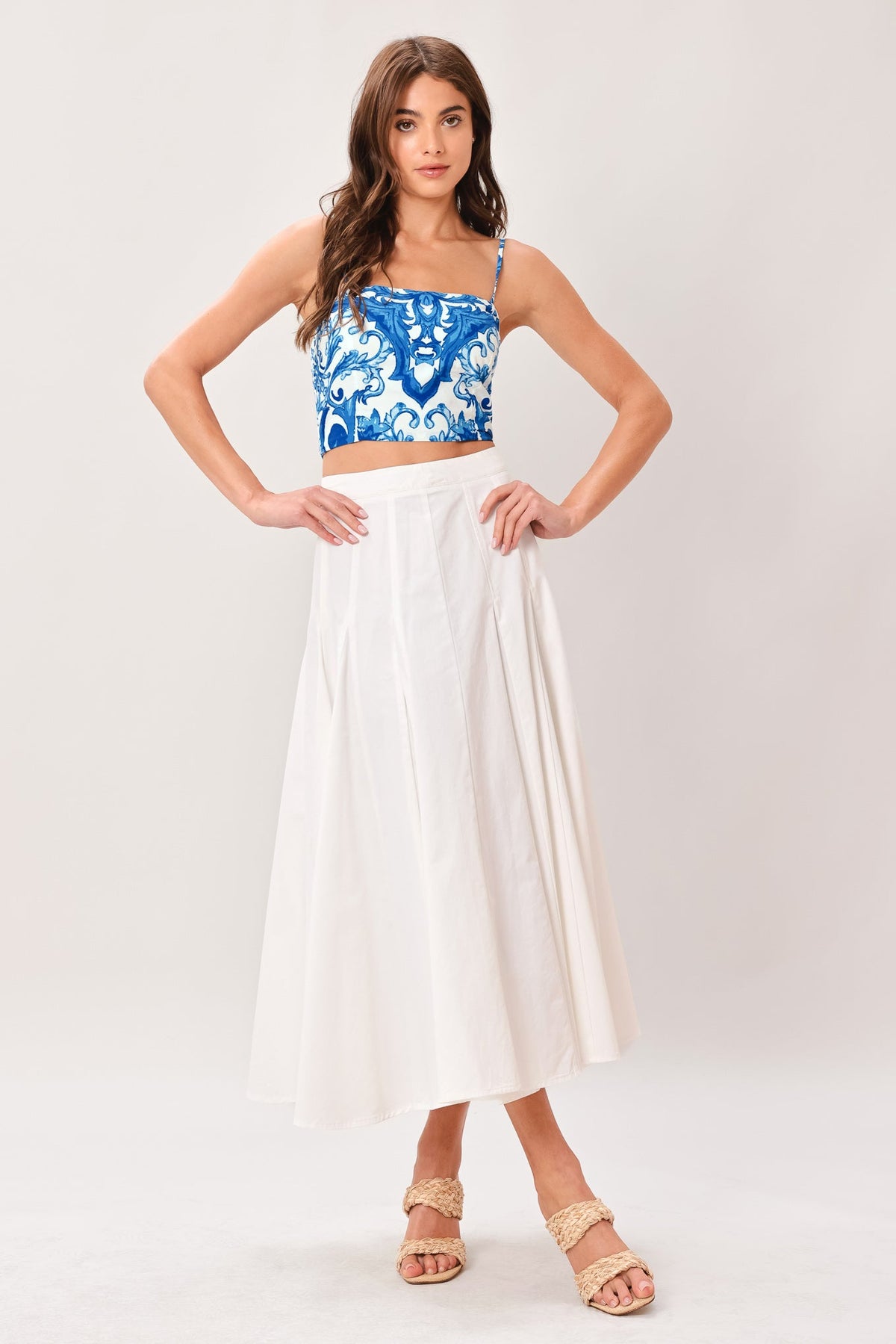 Flying Tomato Coastal Mosaic woven crop top in blue and white with intricate mosaic pattern and lightweight fabric.