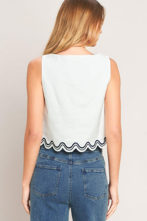 Flying Tomato Urban Wave woven top in off-white with intricate weave pattern and relaxed fit, displayed on a hanger.
