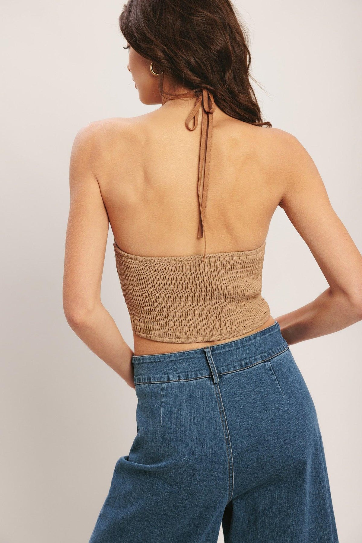 Flying Tomato caramel coast woven crop top in taupe with a textured woven fabric and short sleeves.
