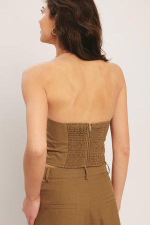 Flying Tomato Umber Flow Woven Halter Top in brick color, featuring a stylish halter neckline and woven fabric detail.