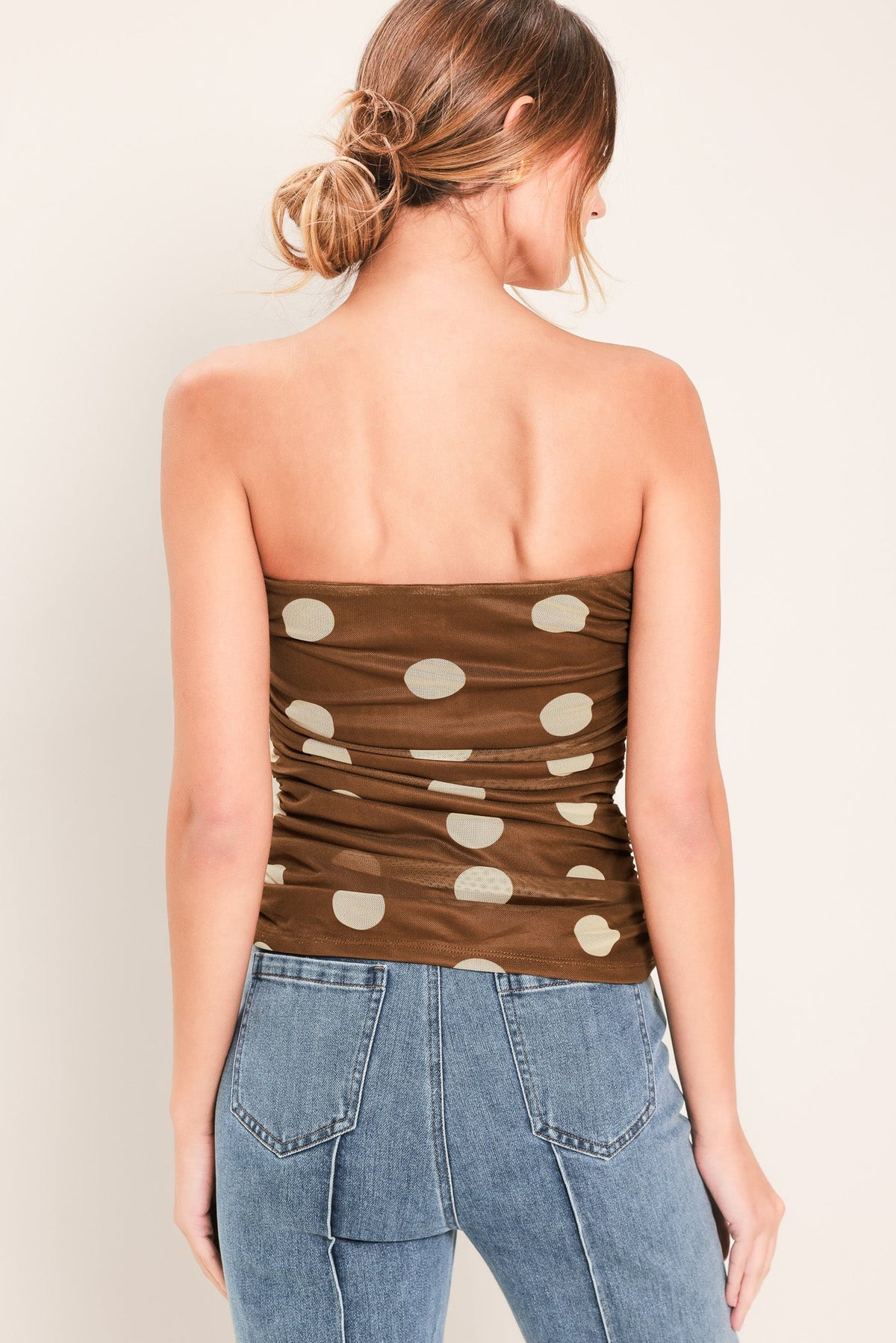 Brown polka dot mesh tube top by Flying Tomato, featuring a fitted style with a sleeveless design and elastic neckline.
