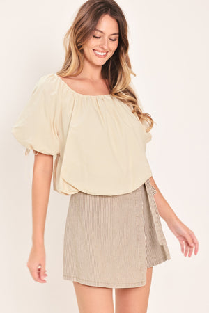 Flying Tomato Natural Charm woven top in stone color, showcasing the textured fabric and stylish design.