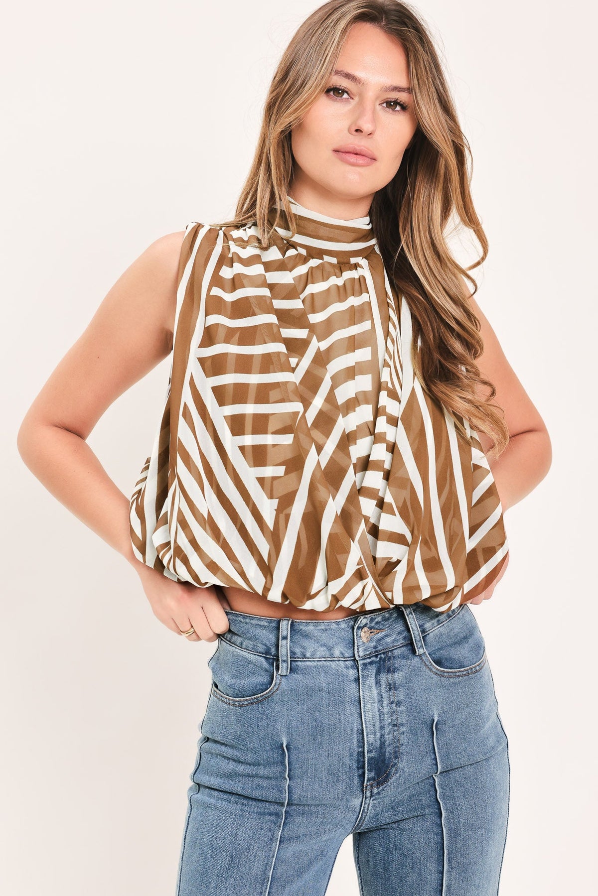 Flying Tomato Latte Ribbon Rhapsody woven top in mocha color, featuring a stylish and comfortable sleeveless design.