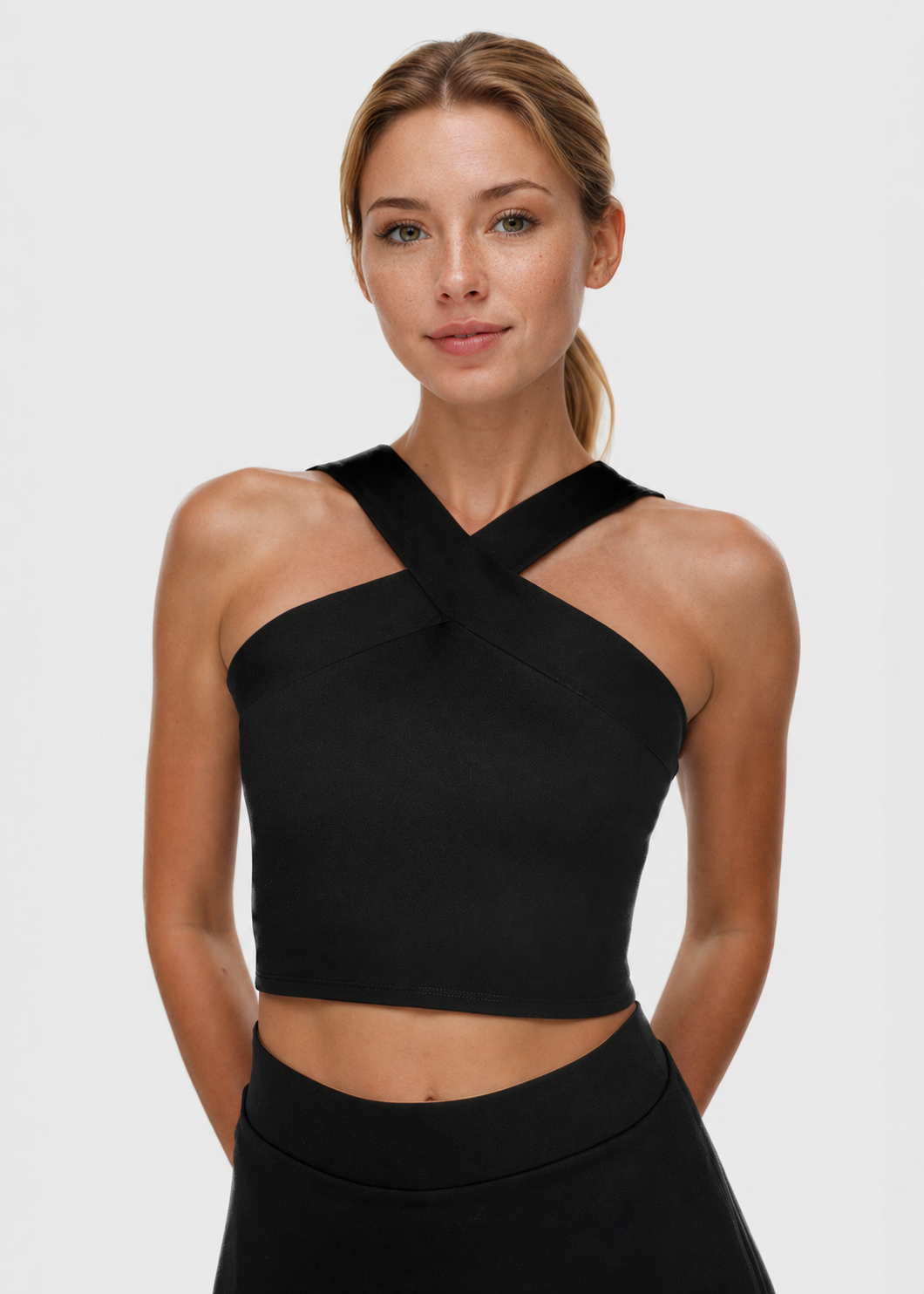 Trophy Yoga criss cross tennis crop top, Made in USA, featuring a sporty sleeveless design