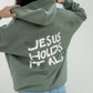 Jesus Holds It All Unisex Hoodie