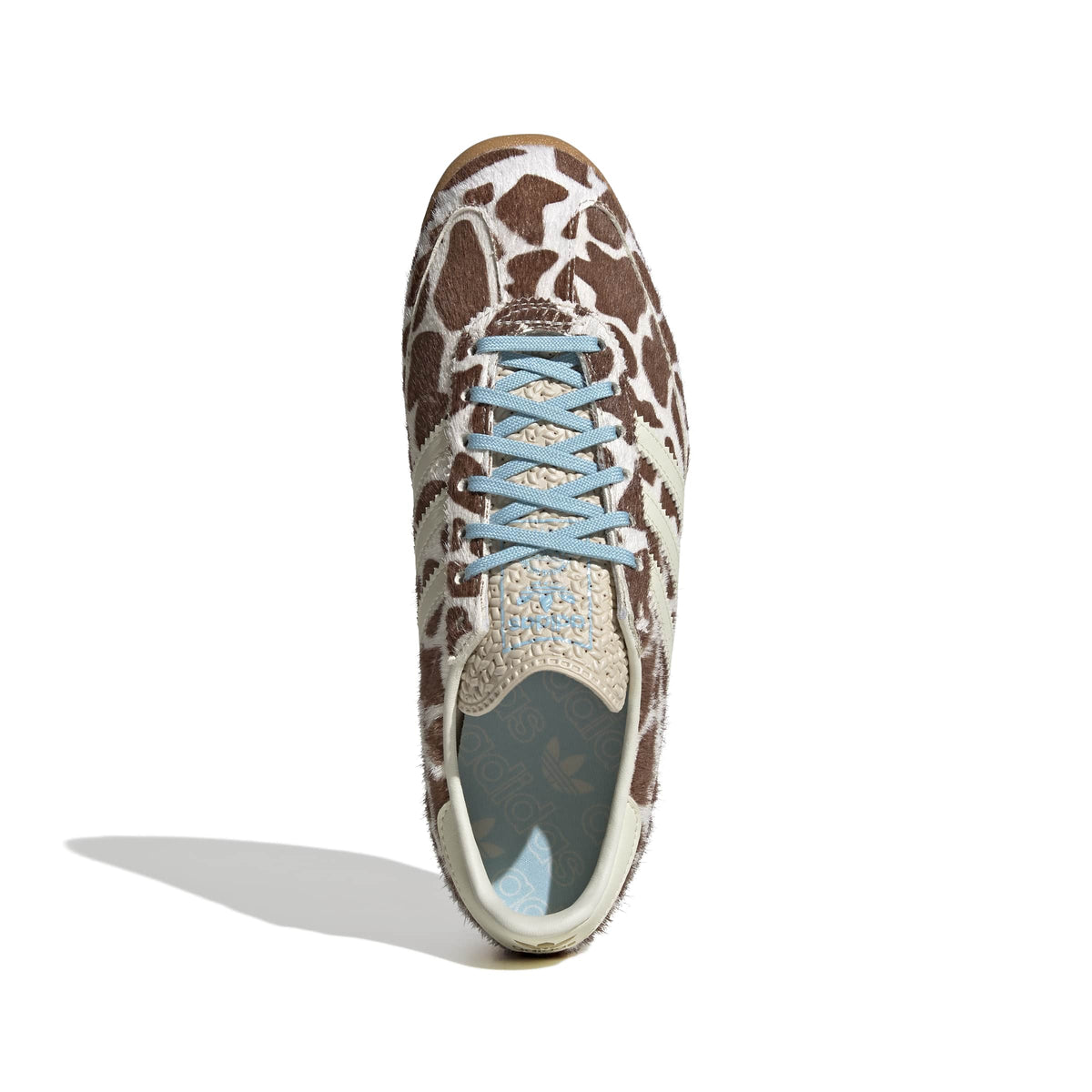 Adidas Womens SL 72 OG cow print sneakers with white laces, top portrait view, showcasing classic design and stylish footwear.