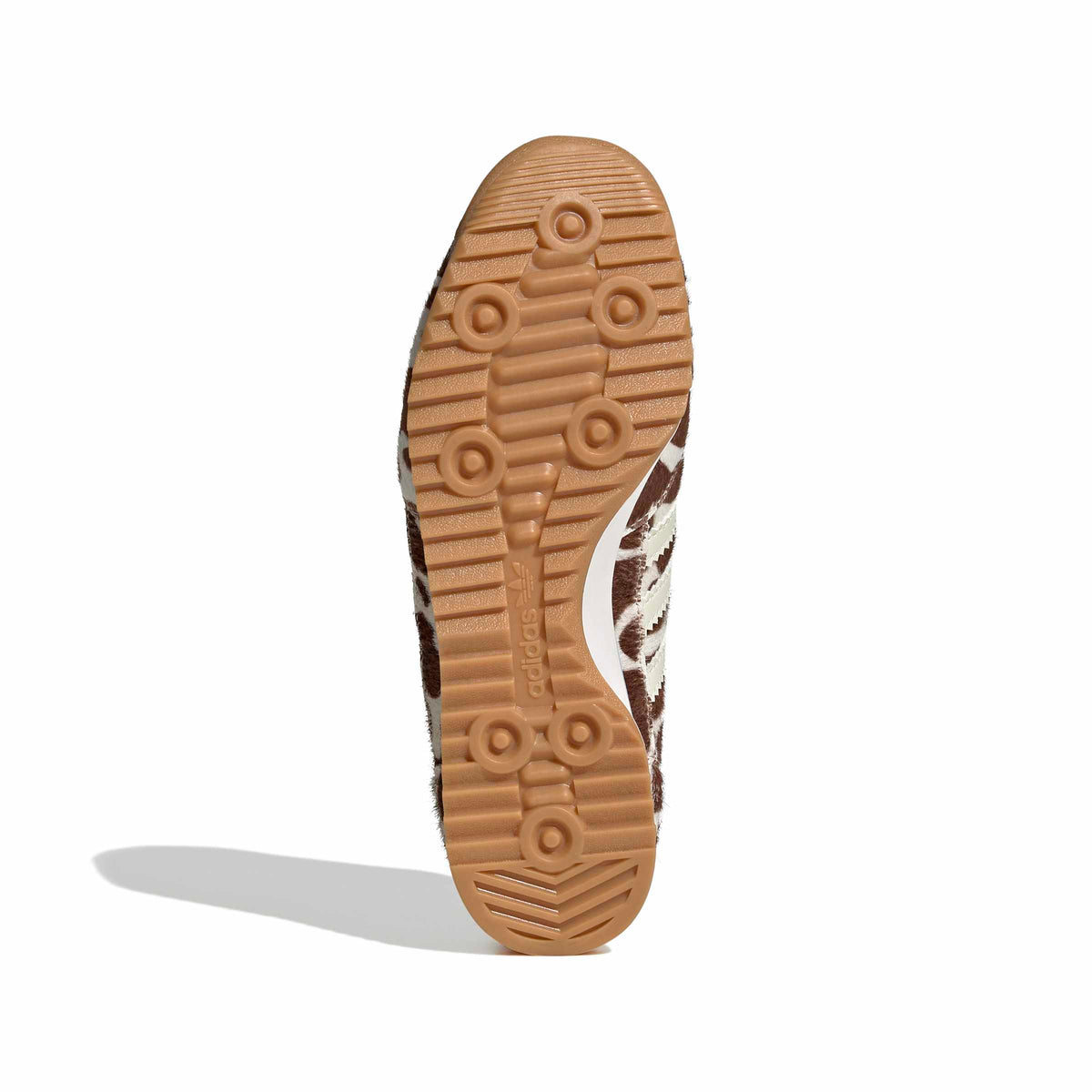 White Adidas Womens SL 72 OG cow print sneakers viewed from the bottom, showcasing the outsole and classic design.