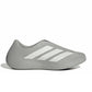 Men's Adidas Purechill grey footwear side view showing sleek design and breathable material for comfortable casual wear.