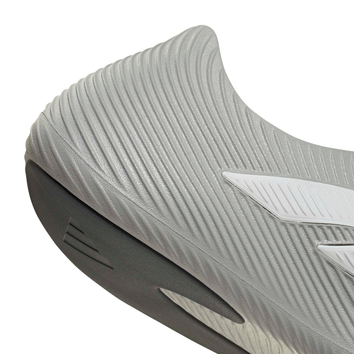 Gray Adidas men's Purechill footwear with detailed stitching, showcased in a close-up view for comfortable, stylish men's shoes.