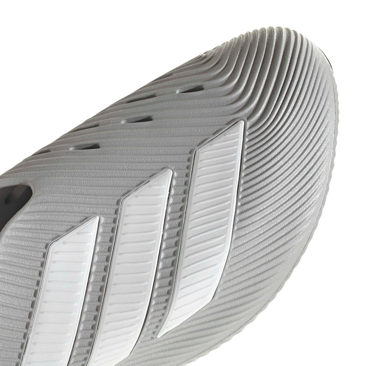 Close-up of Adidas men's Purechill grey footwear showing detailed stitching and design elements.