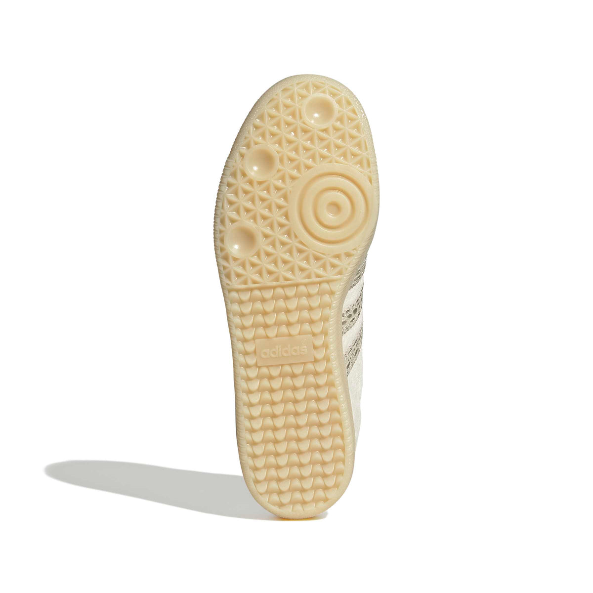 Adidas Womens Samba OG cream and maroon footwear shown from the bottom view, highlighting the sole and stylish design.