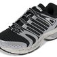 Black and silver Adidas Big Kids Adistar Control 5 gradeschool sneakers, side view showing stylish athletic design.