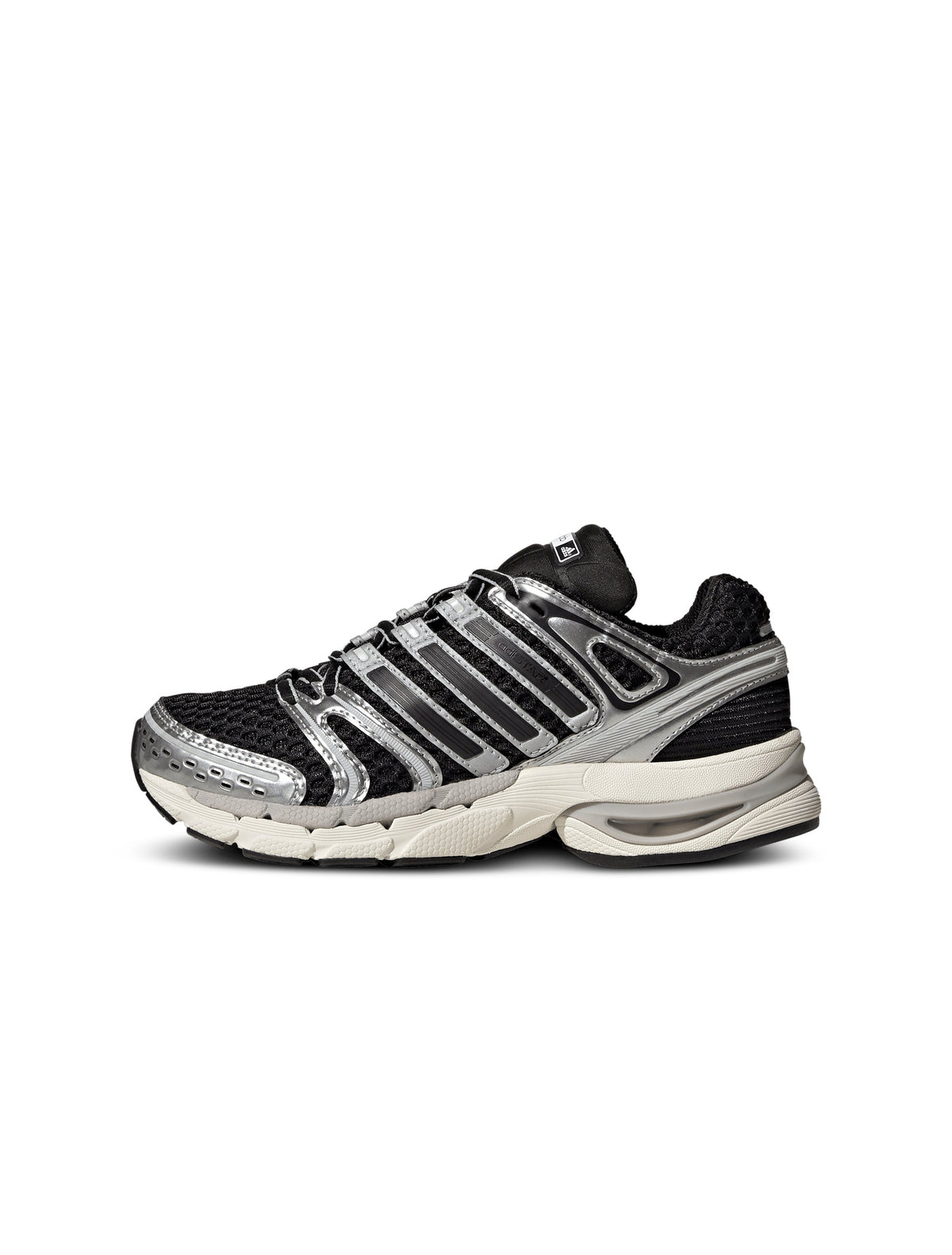Adidas Big Kids Adistar Control 5 grade school footwear in black and silver, side view showing sporty design and supportive sole.