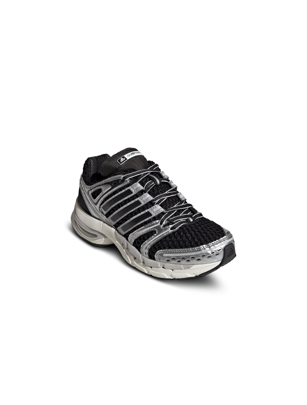 Black and silver Adidas Big Kids Adistar Control 5 gradeschool sneakers shown from front, side, and top view.