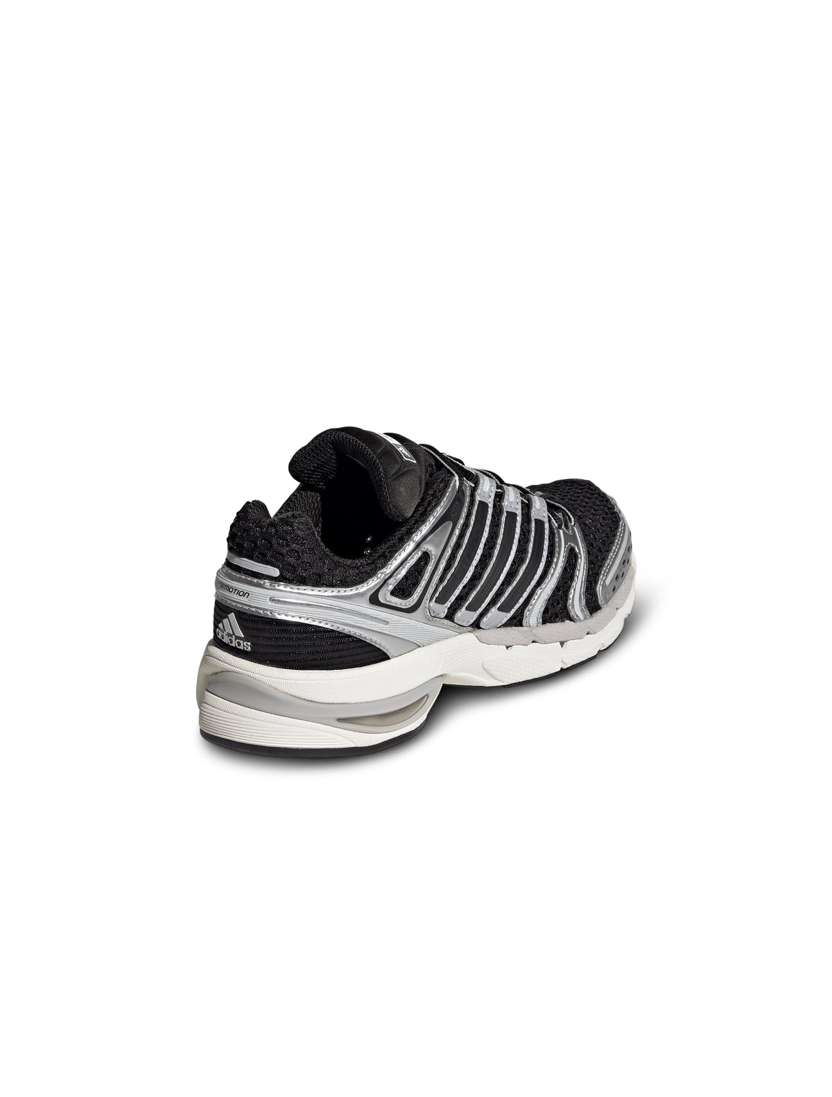 Black and silver Adidas Big Kids Adistar Control 5 gradeschool footwear shown from back, lateral, and top views.