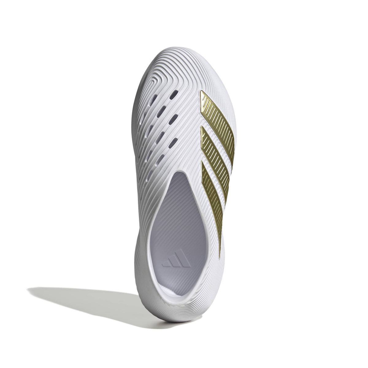 Adidas men's Purechill white and gold footwear shown from a top portrait view, showcasing sleek design and stylish detailing.
