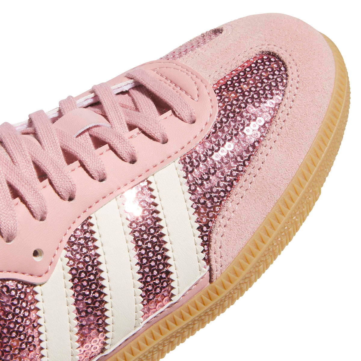 Pink Adidas Womens Samba OG footwear with white accents, detailed view showing the classic design and textured material.