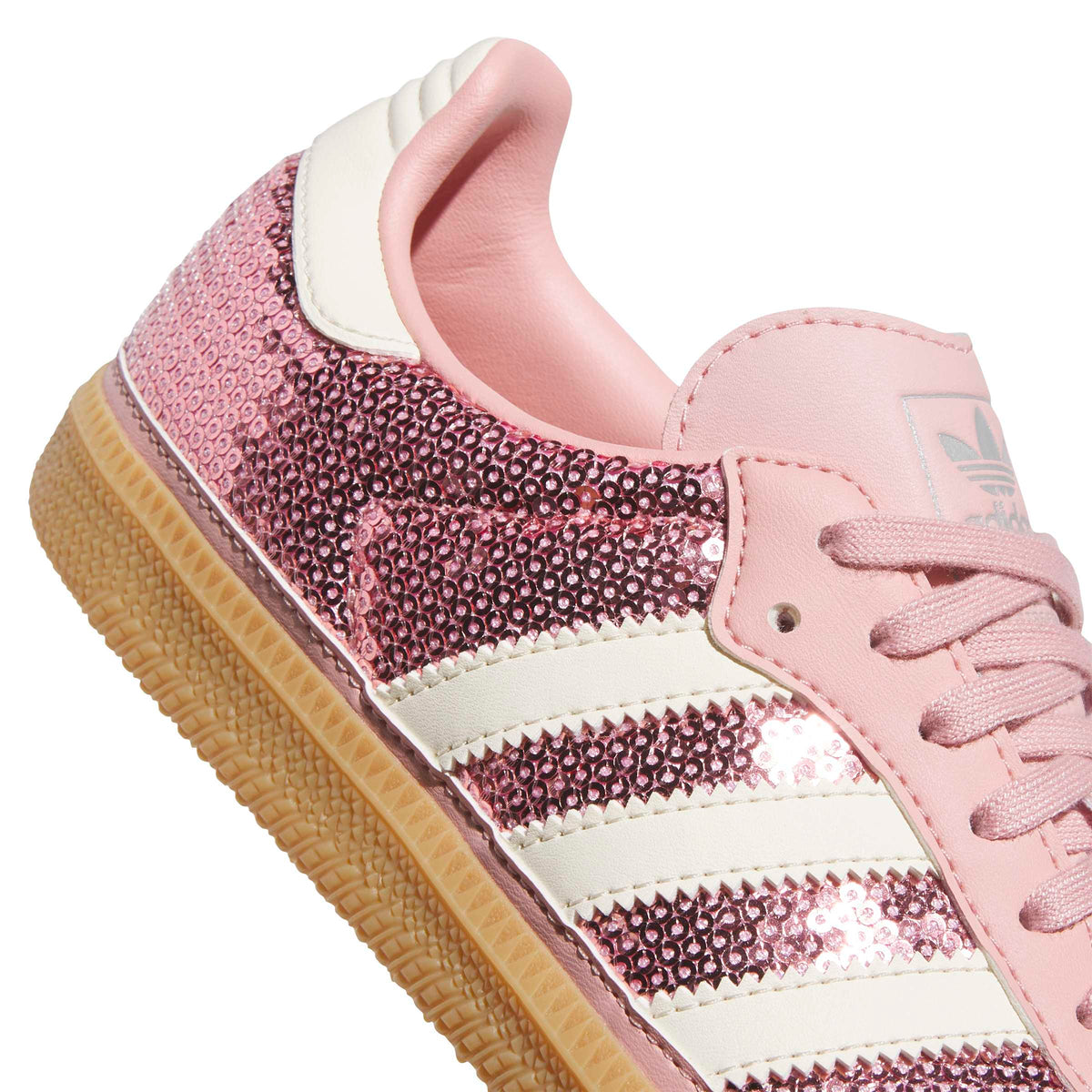 Adidas Women's Samba OG pink sneakers, detailed view showcasing white and pink leather footwear for women.