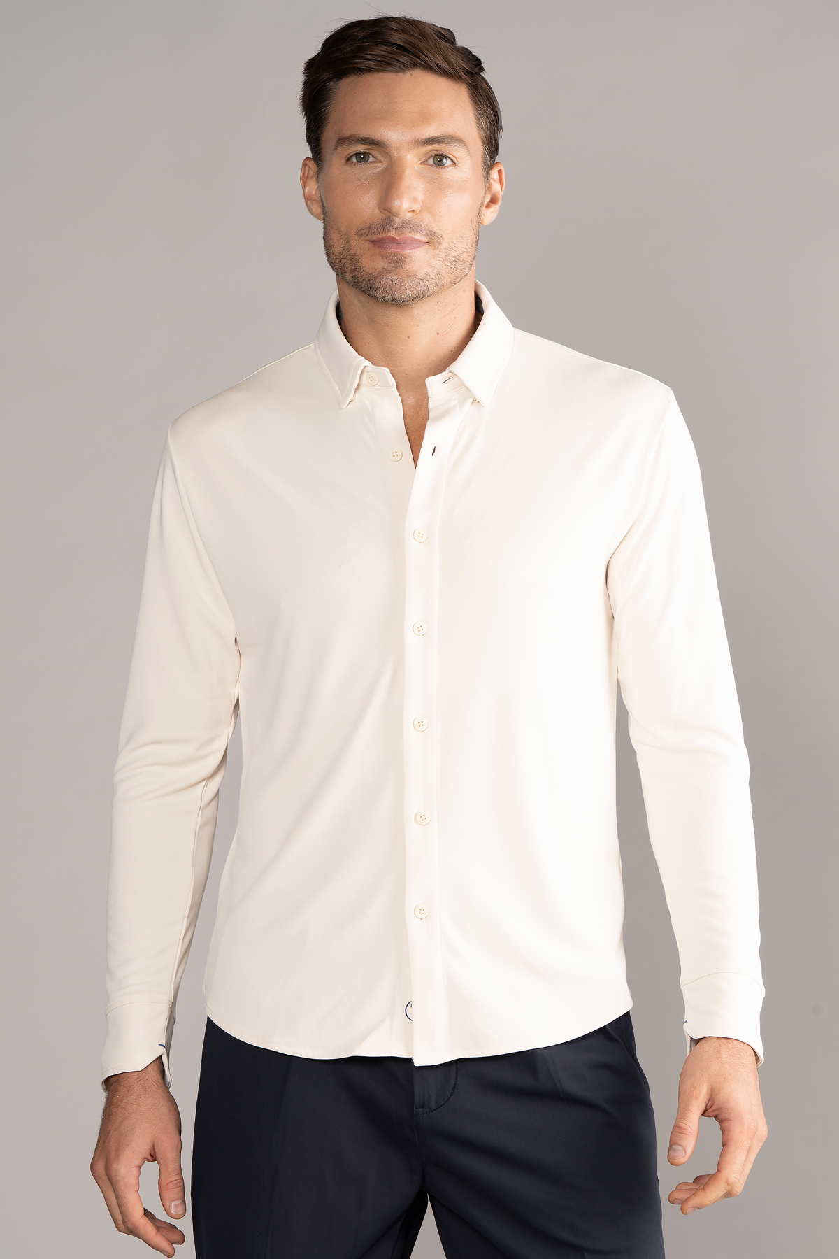 Ivory long sleeve button-down polo shirt by Twillory, featuring a classic solid design and front view.