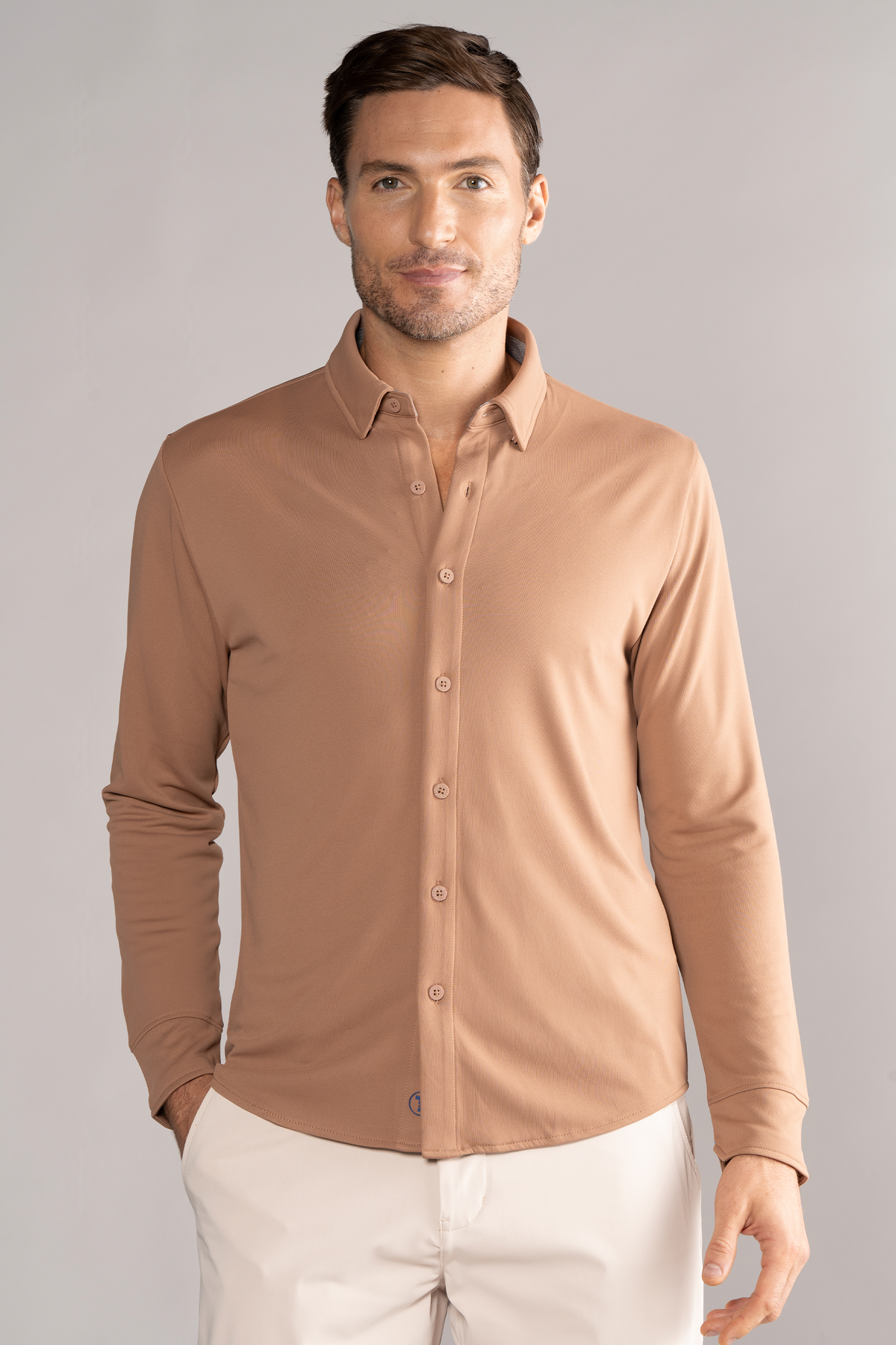 Twillory long sleeve button-down polo shirt in solid clay color, front view showing classic collar and button details.