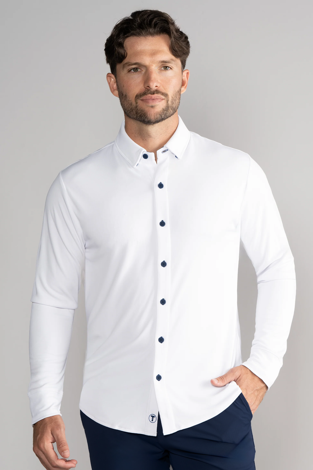 Men's long sleeve button-down polo shirt in white with navy contrast from Twillory, front view showing collar and button details.