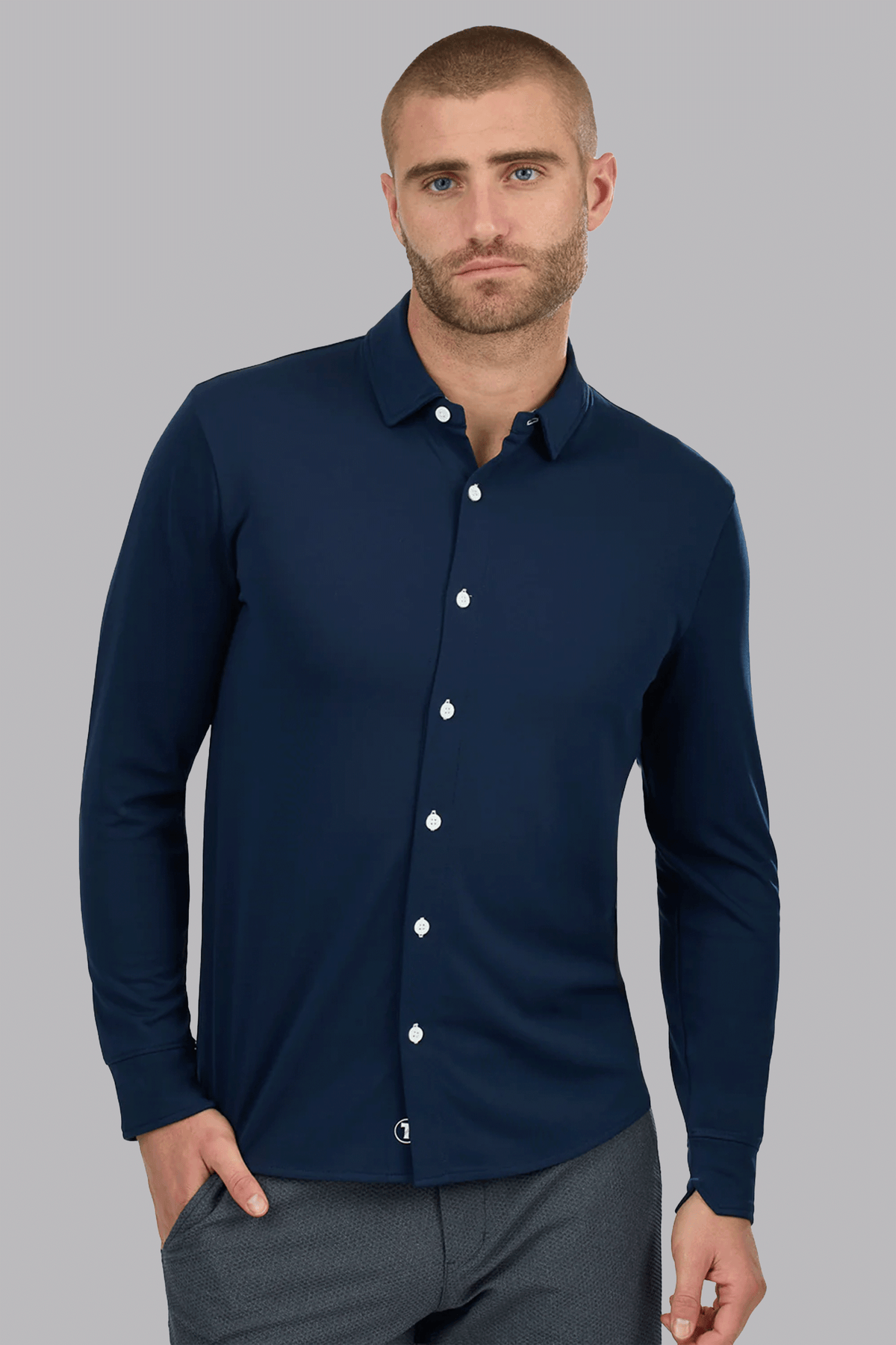 Navy and white contrast long sleeve button-down polo shirt by Twillory, front view showing classic collar and button closure.