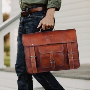 Classy Leather Bags MaheTri Front Pocket messenger bag in black, featuring a front pocket and adjustable shoulder strap.