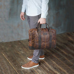 Classy Leather Bags MaheTri Jefferson briefcase with leather handle, sleek design, and multiple compartments in a lifestyle setting.