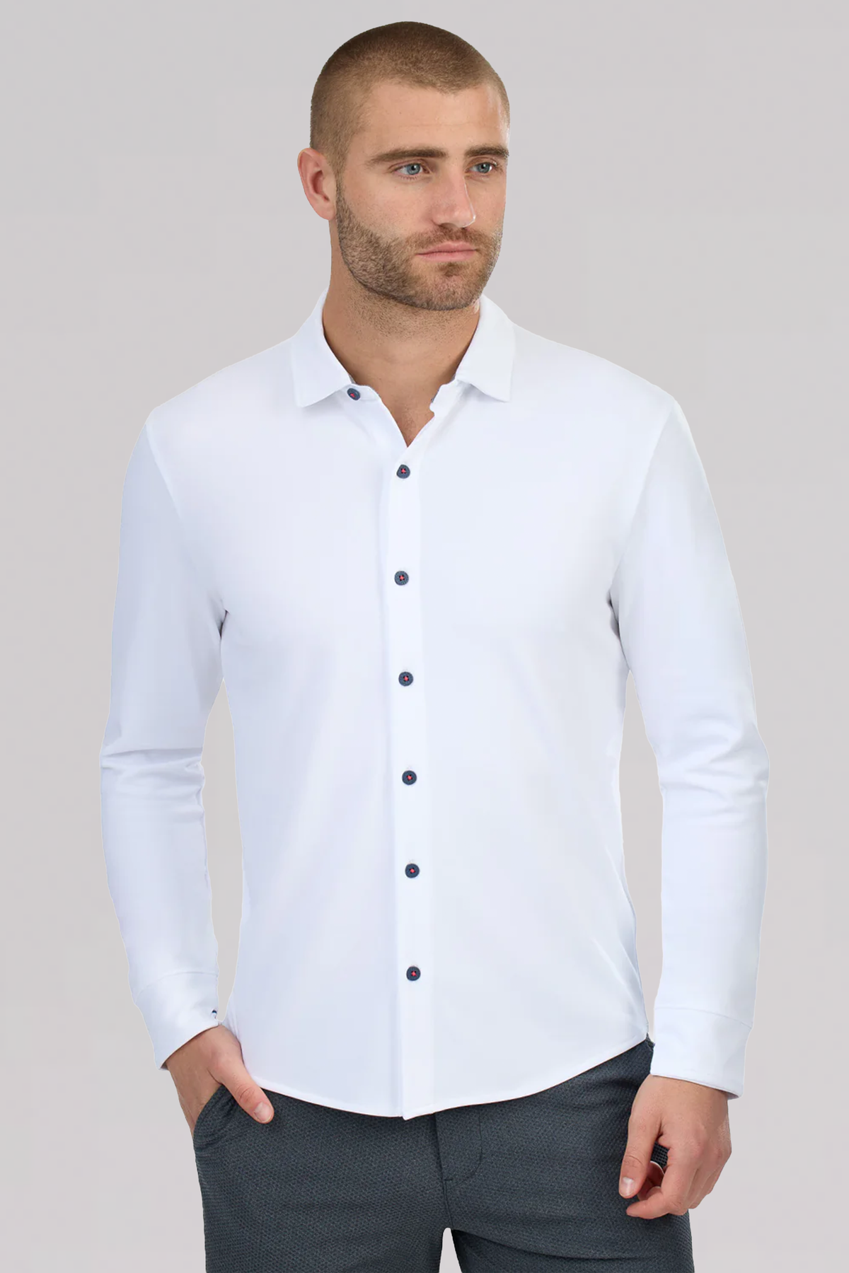 Twillory long sleeve button-down polo shirt with contrast white and navy stitching, featuring a classic collar and front buttons.