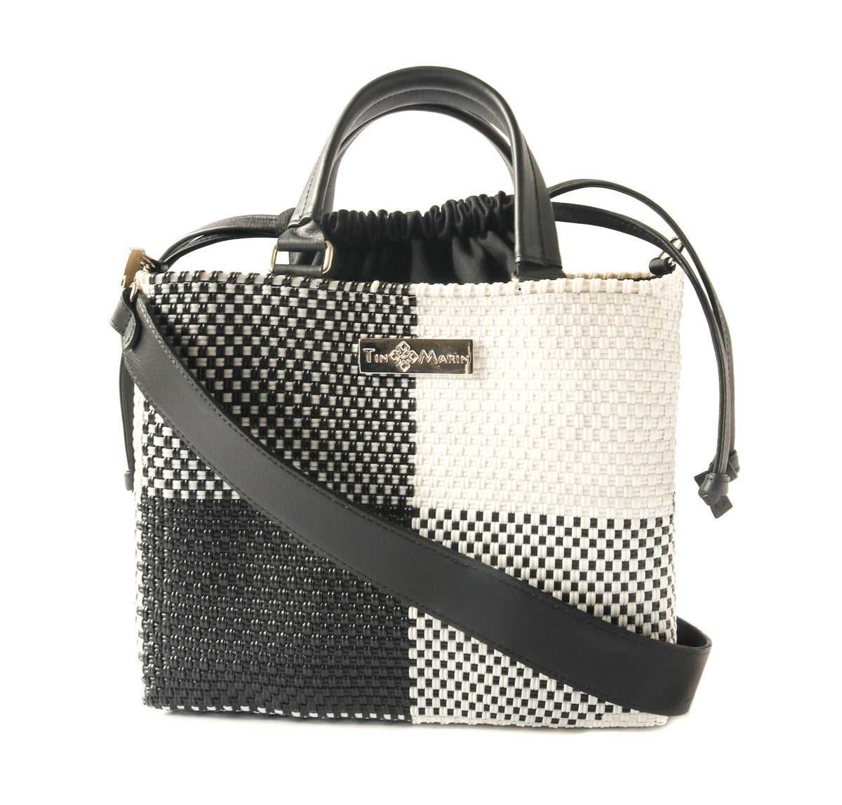 Tin Marin Lucy Medium Woven Crossbody Bag with drawstring closure, featuring a woven fabric design and adjustable strap.