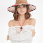 Peter Grimm Luz straw lifeguard hat in natural woven straw with wide brim and chin cord
