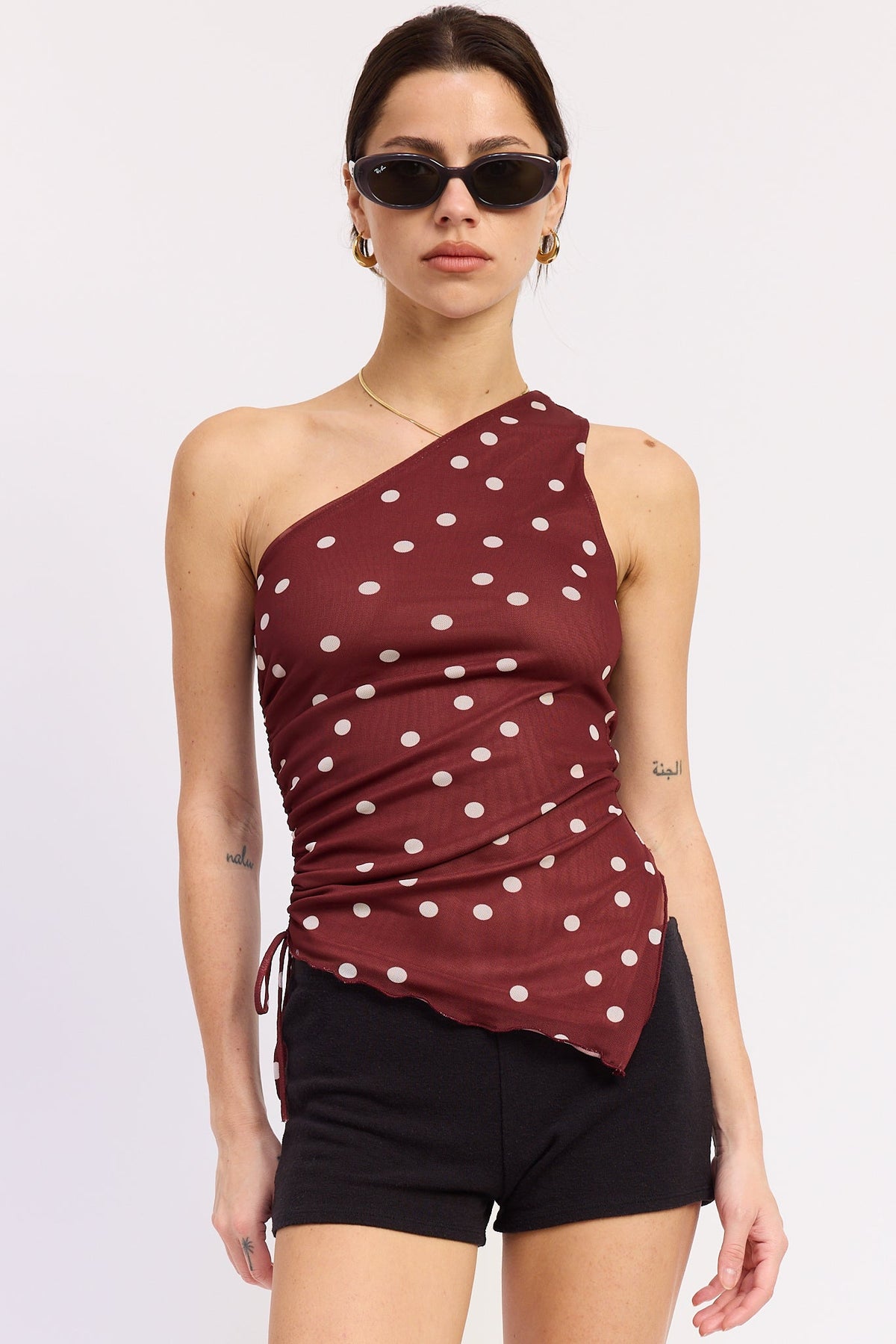 Maroon polka dot Maya Top by Emory Park, casual women's blouse with a relaxed fit and stylish pattern.