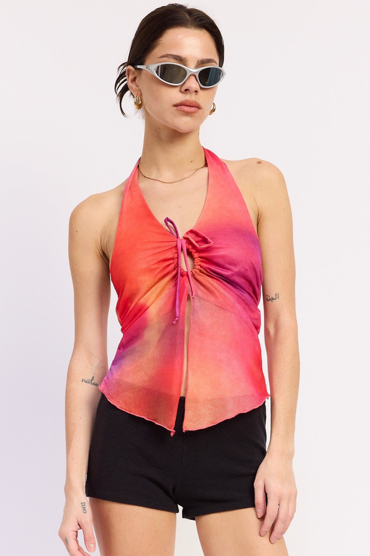 Emory Park Evania halter top in vibrant orange fuchsia, featuring a stylish sleeveless design and tie-front detail.