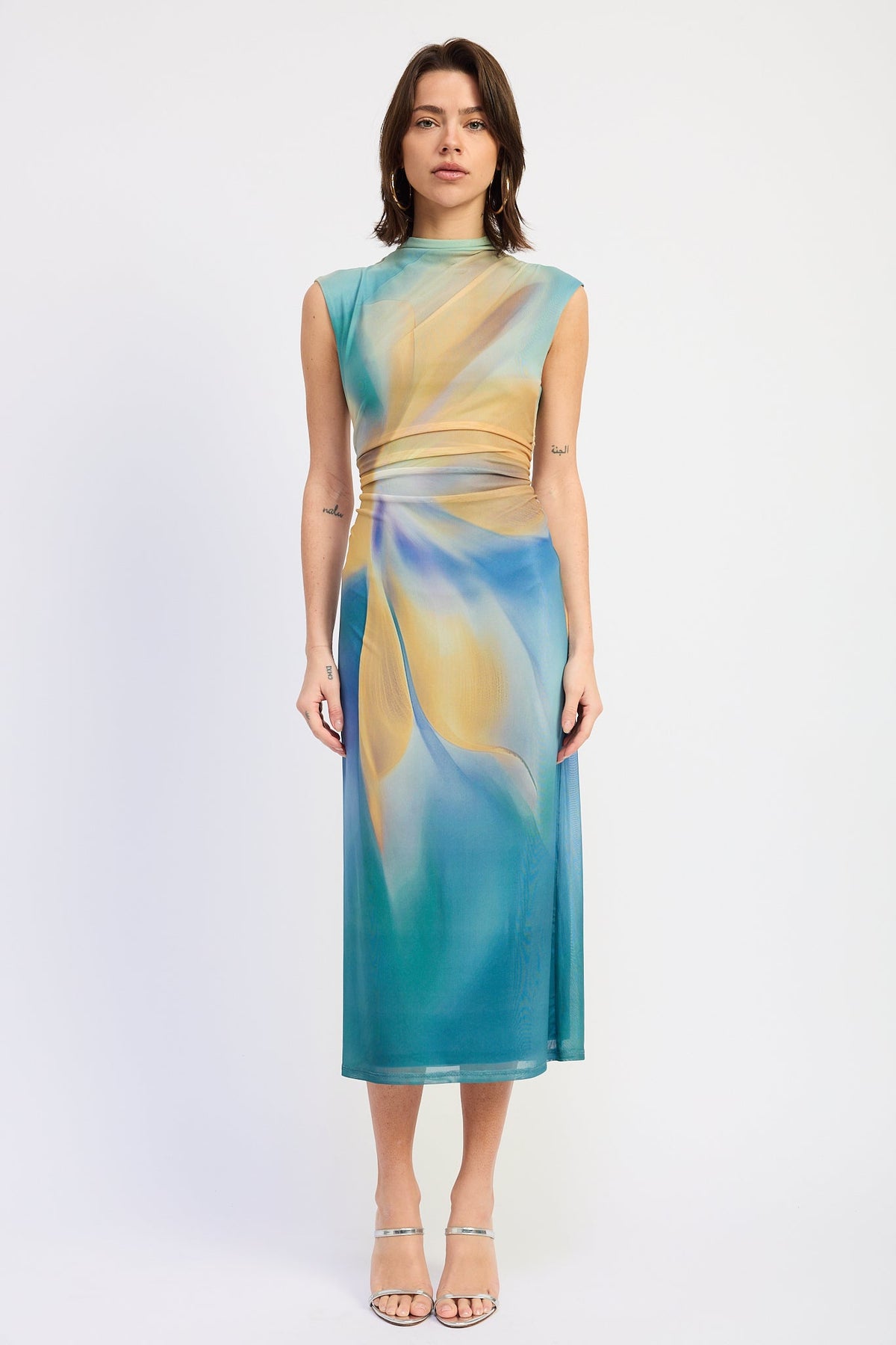 Emory Park Avalon Midi Dress in blue-green multi with a flowing silhouette and elegant design, displayed on a hanger.