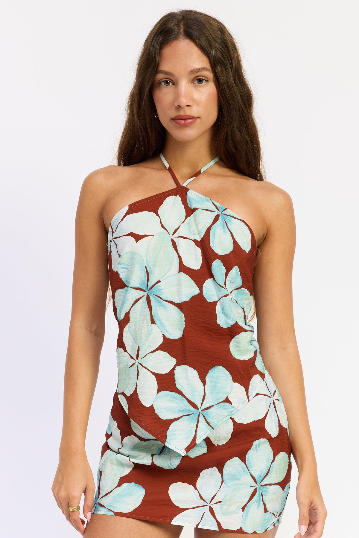 Emory Park Giselle Scarf Top in brown floral print, stylish sleeveless blouse with a scarf neckline and feminine design.