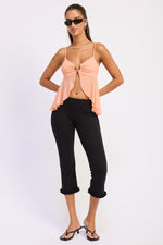 Emory Park Samira mesh top in cantaloupe color, lightweight and stylish women's blouse with breathable mesh fabric.